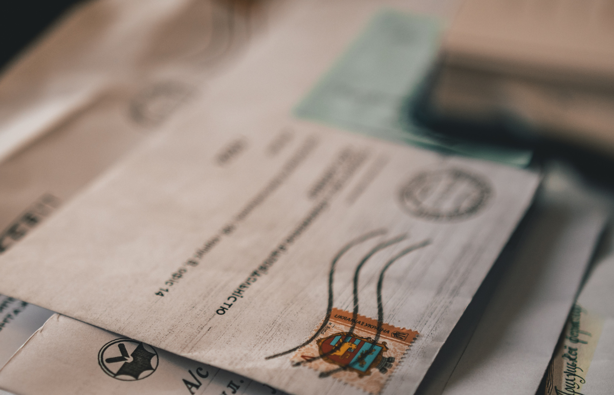 close up of a pile of letters in envelopes