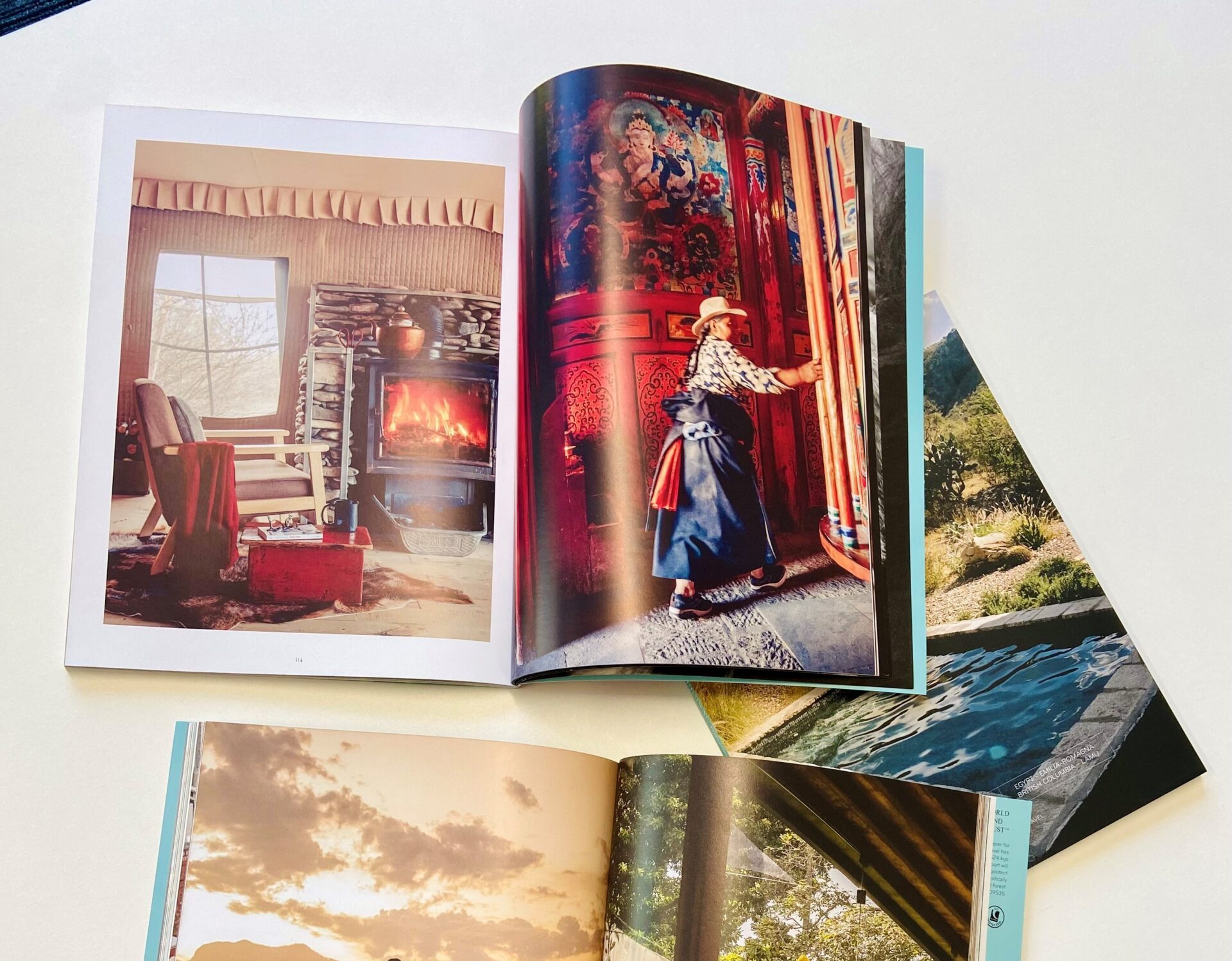 A selection of magazines featuring images from around the world.